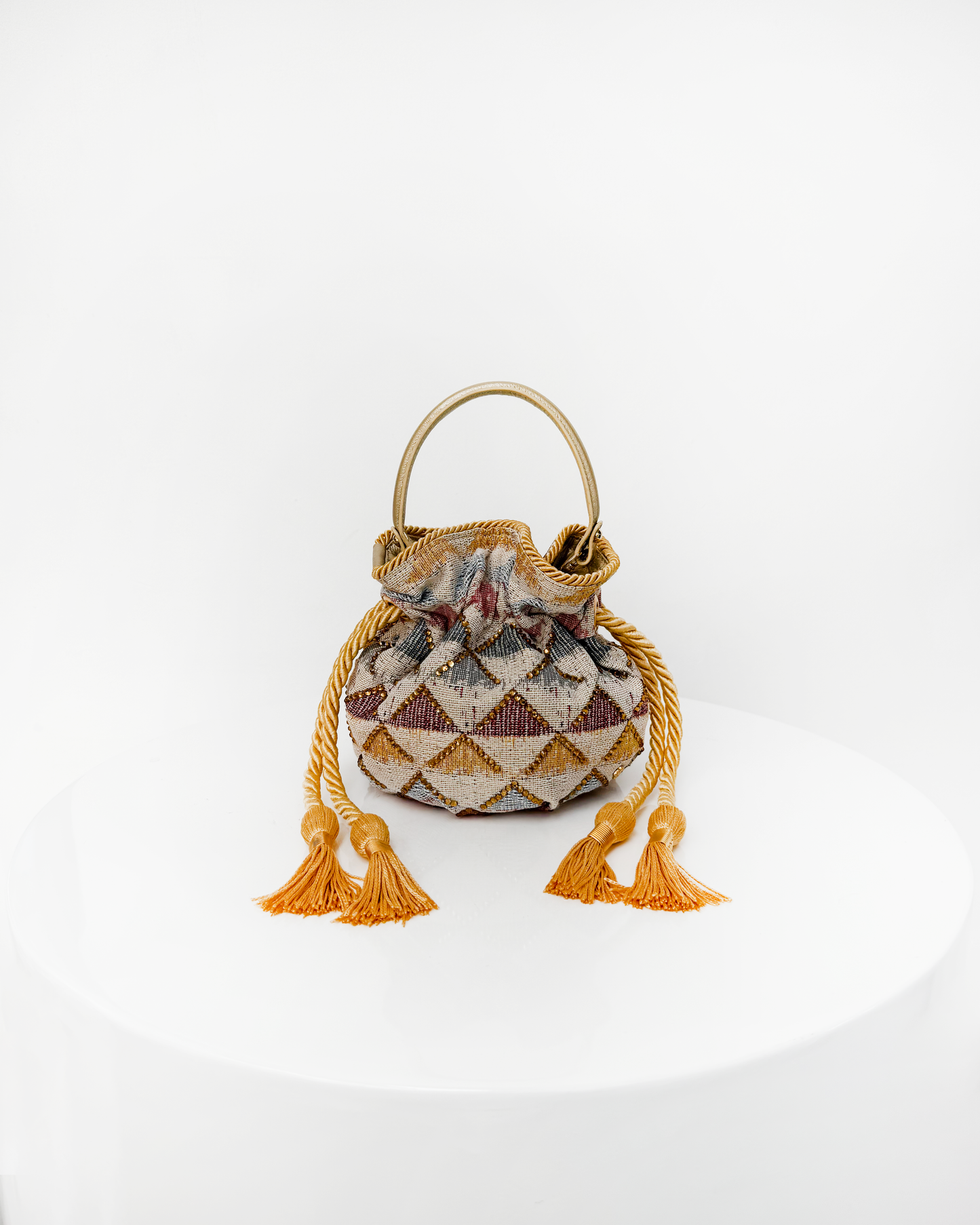 BOUCHER BUCKER BAG -TRIANGULOS ROSADOS