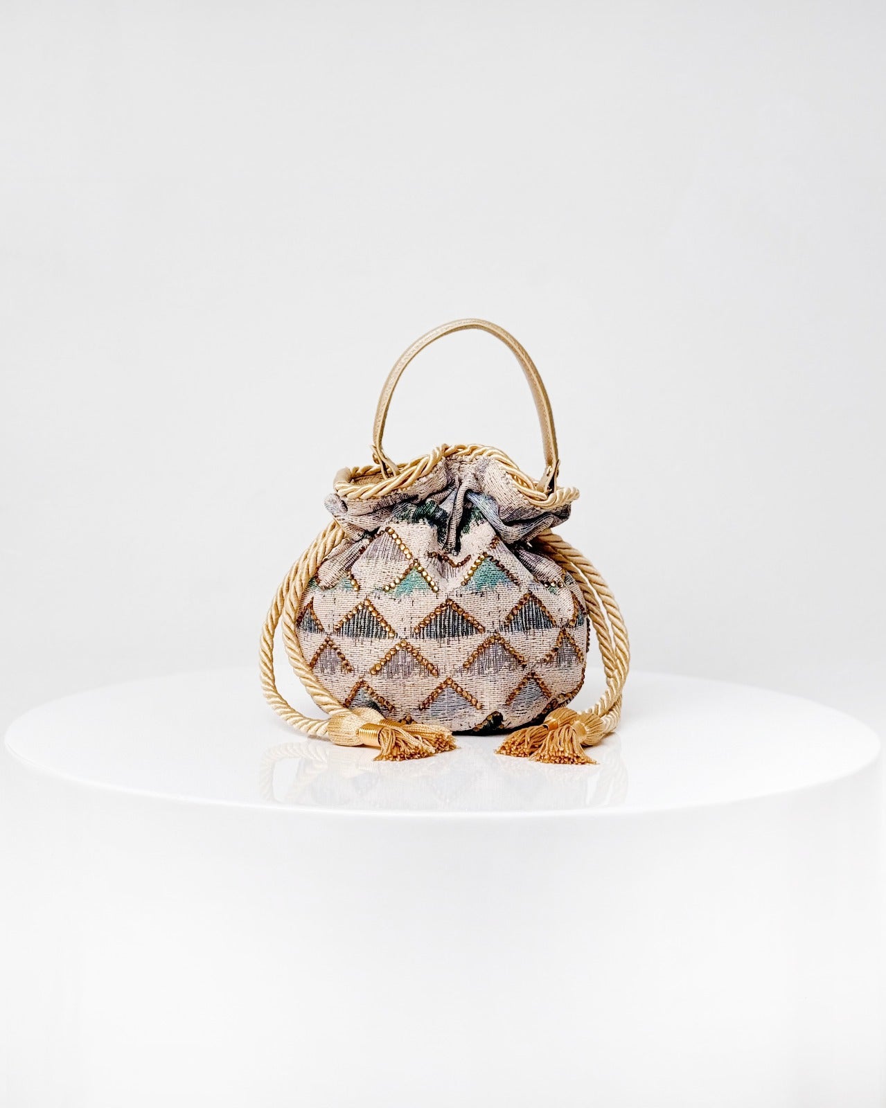 BOUCHER BUCKET BAG - TRIANGULOS TURQUESA