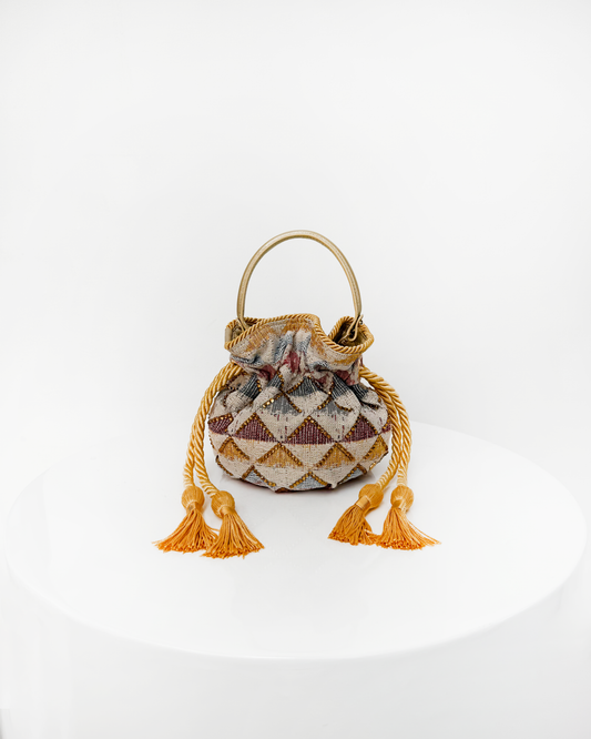 BOUCHER BUCKER BAG -TRIANGULOS ROSADOS